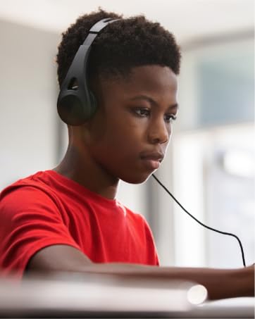 Student using TWT Audio ERGO headphones to study while using a tablet