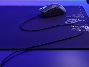 ROG Gladius III Core on a table with very long paracord cable