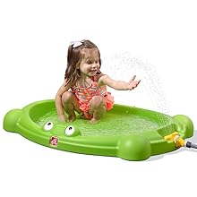 Girl on Splash Pad with sprinkler running