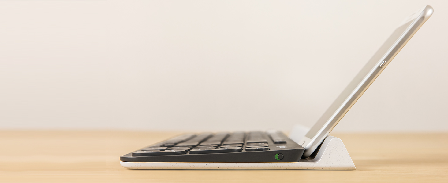 Integrated rubber cradle holds mobile devices