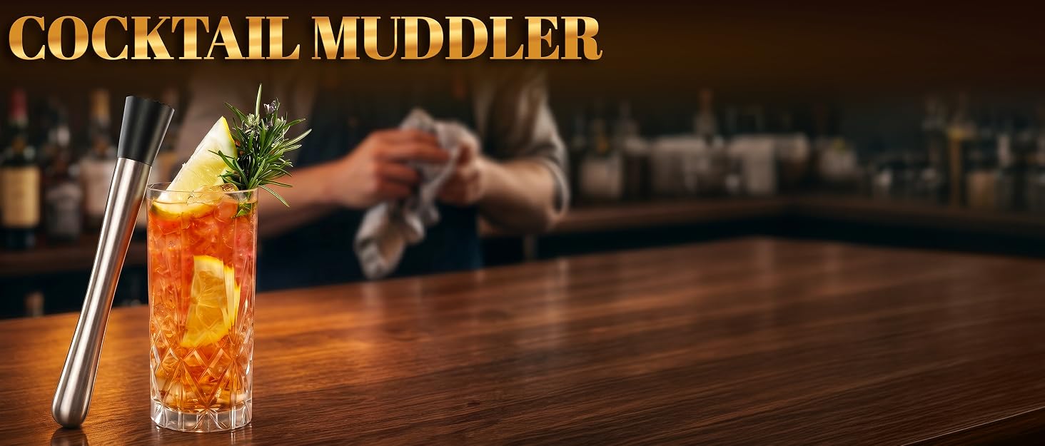 fruit muddler for drinks next to jar with lime mint and straw on kitchen counter