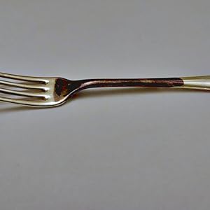 Silver fork - dipped at both ends