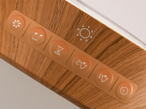 Close-up shots of a wooden surface with embedded control buttons or indicators, showing different angles of the interface design.