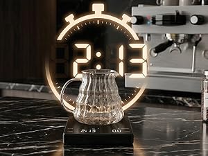A mini coffee scale sits on a premium home coffee bar, with the timer running.