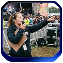 Event staff coordinating communications, highlighting fast fleet setup with Chirp programming cable