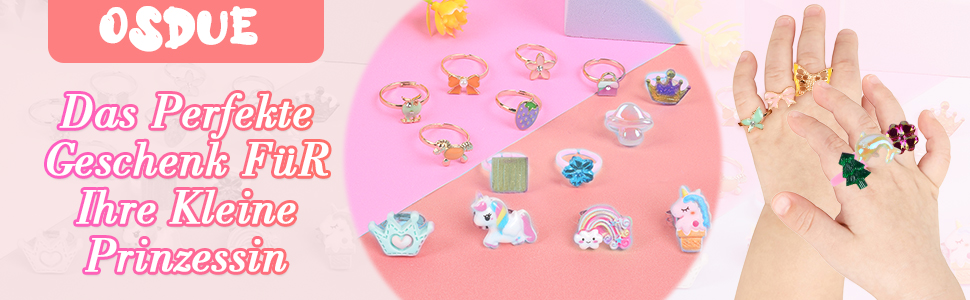 Text reads 'Das Perfekte Geschenk Für Ihre Kleine Prinzessin' ('The Perfect Gift For Your Little Princess'). Pink background with scattered jewelry or sticker elements showing small decorative items.