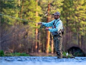 Photo of fisherman casting a fishing line into a river