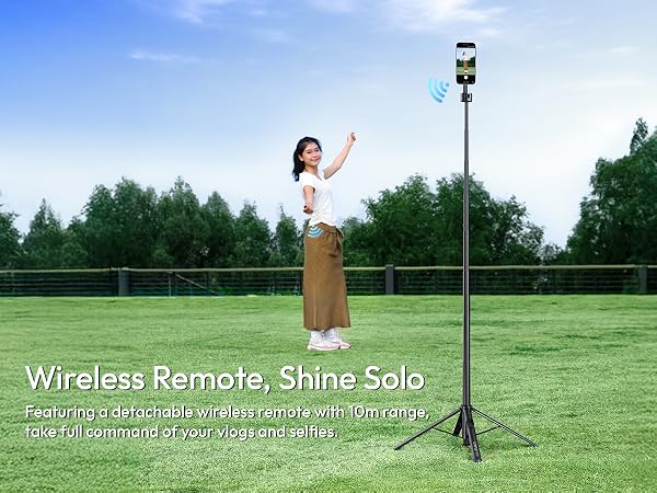 Text reads 'Wireless Remote, Shine Solo'. Professional lighting equipment shown in outdoor setting on grassy field with trees in background.