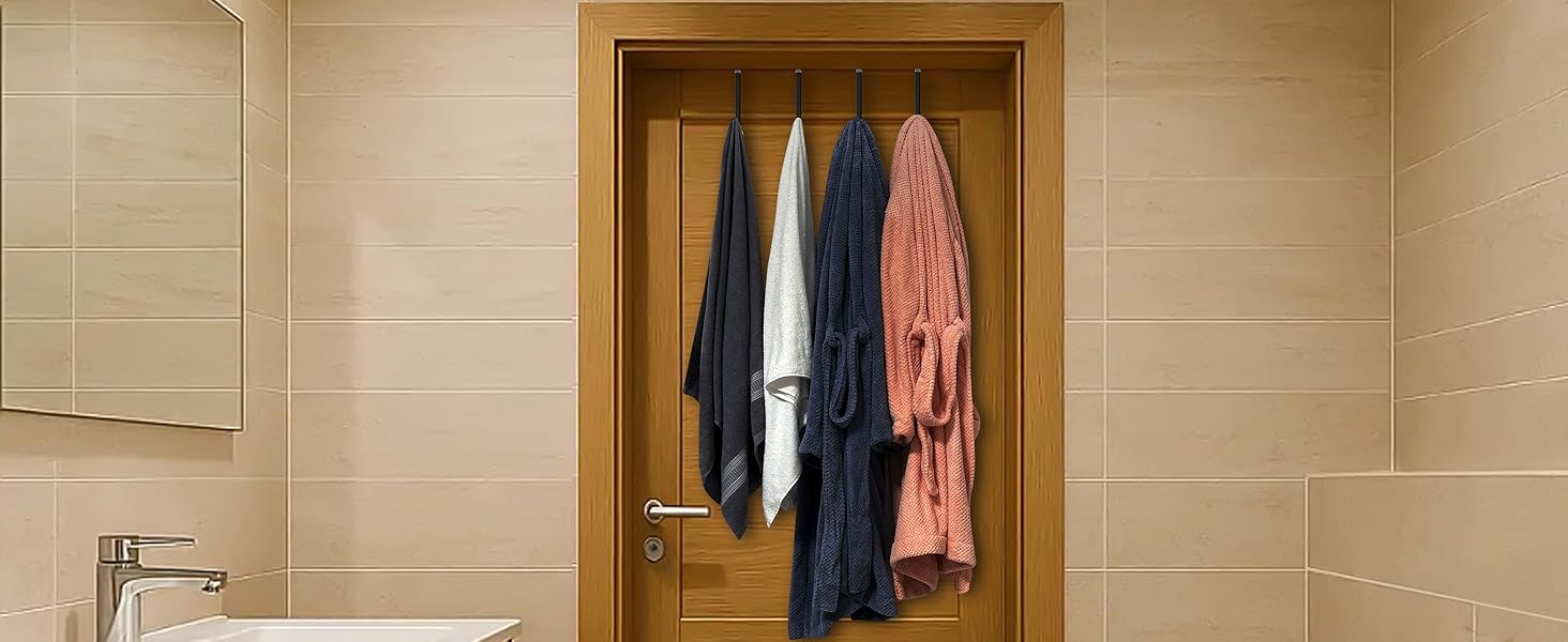 Two bath towels and two bathrobes hang from four hooks on bathroom door with hook size