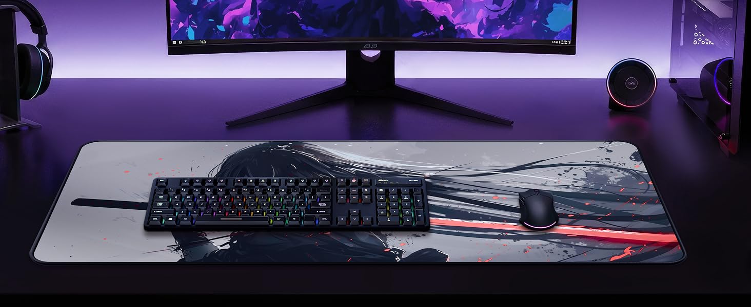 Gaming desk setup with purple ambient backlighting. Black mechanical keyboard with cable, wireless mouse, and mouse pad on dark surface. Dual monitors mounted above desk in gaming configuration.