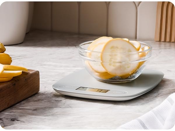 Meal prep with greater goods nutrition scale, Scale sitting on countertop with chicken on surface