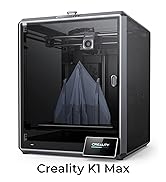 Creality K1 Max 3D printer with enclosed build chamber, displaying a blue pyramid-shaped object in progress.