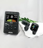 Wireless security camera system showing a black smartphone displaying camera feed alongside a white indoor camera unit with green accents.