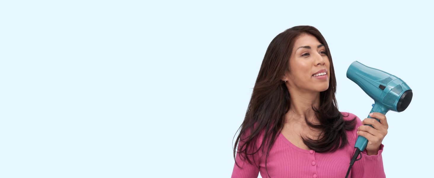 Woman with hair dryer