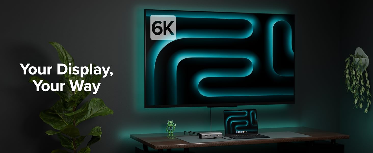 Thunderbolt 5 hub connected to laptop and monitor in a modern workspace with 6K display