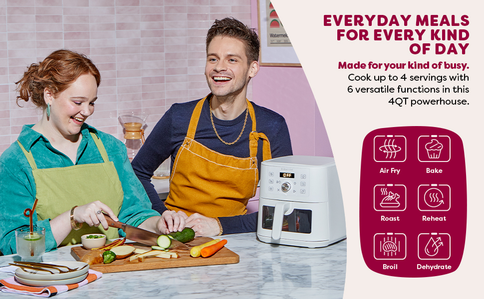 happy couple slicing vegetables to cook in the mini air fryer in sea salt
