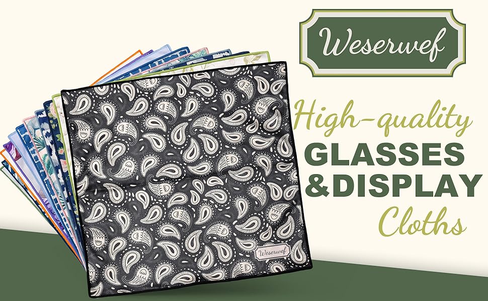 Stack of patterned cloths for cleaning glasses and displays. Top cloth features black and white paisley design. Weserwef brand logo visible.