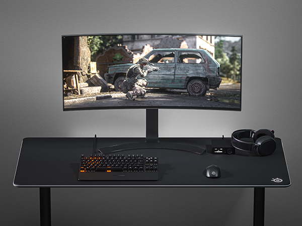 - SteelSeries desk setup with Rival 3 wireless mouse