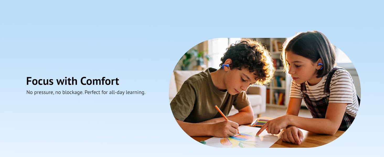 Child drawing at home wearing comfortable open-ear headphones for homework and focus.