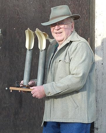 Gene Peet holding original Peet Dryer