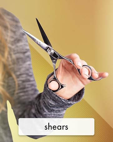 Image of woman holding hairstyling haircut shears with text reading shears.