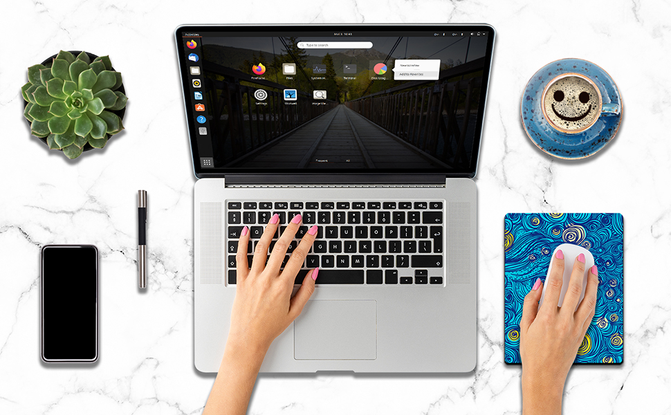 Mini mouse pad on desk