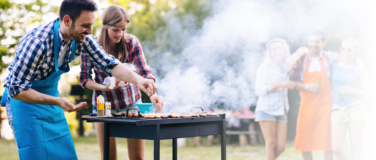 friends cooking on a barbecue