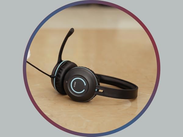 A Cyber Acoustics headset being drug on the floor 