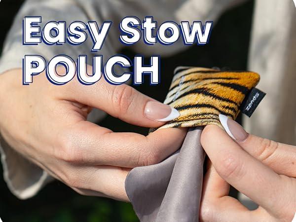 One side shows 2 sizes of spudz the other side shows a woman stuffing the cloth back in pouch