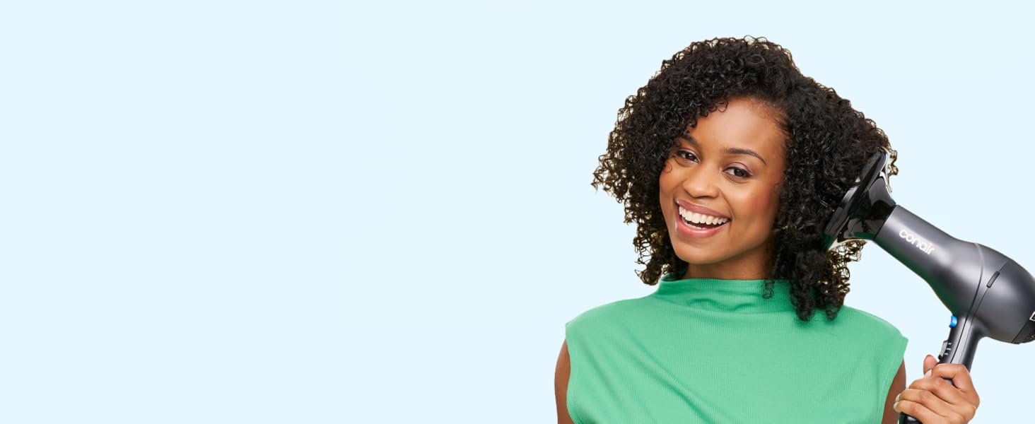 Woman using diffuser attachment