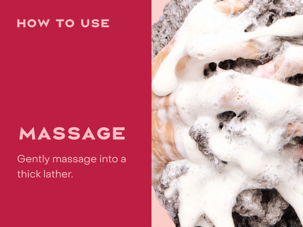 Close up shot of woman's hands massaging heir covered in foam, next to massaging instructions.