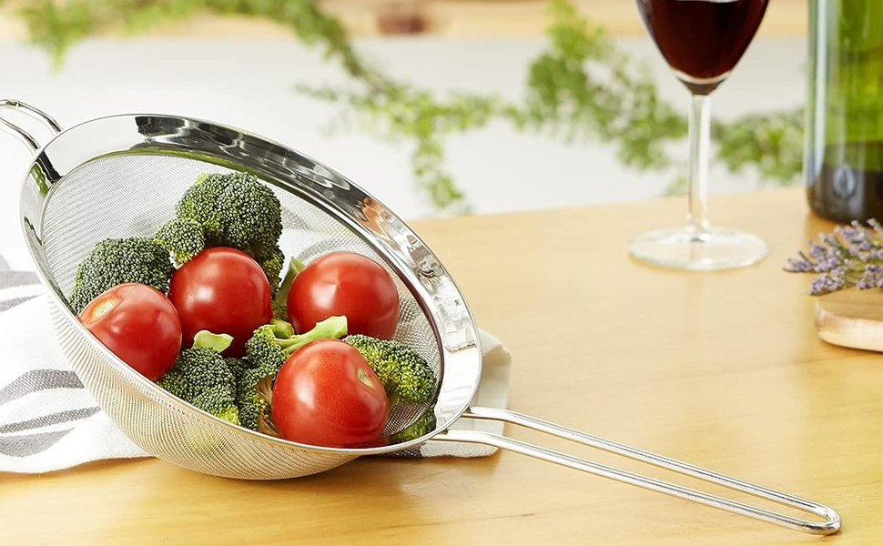 Large mesh strainer for an assortment of produce with long handle