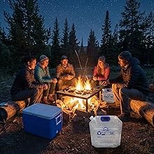 Collapsible water bags being used by the campfire