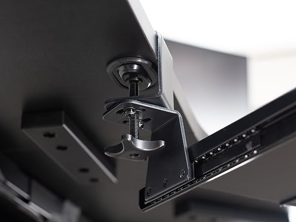 Swiveling clamps secured to desktop