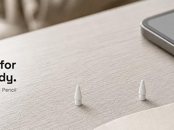 NXVX soft replacement tips beside a tablet for quiet study