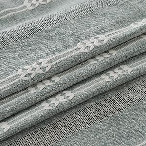 cotton linen tablecloth with distinctive jacquard patterns and cut-out design, elegant home decor.