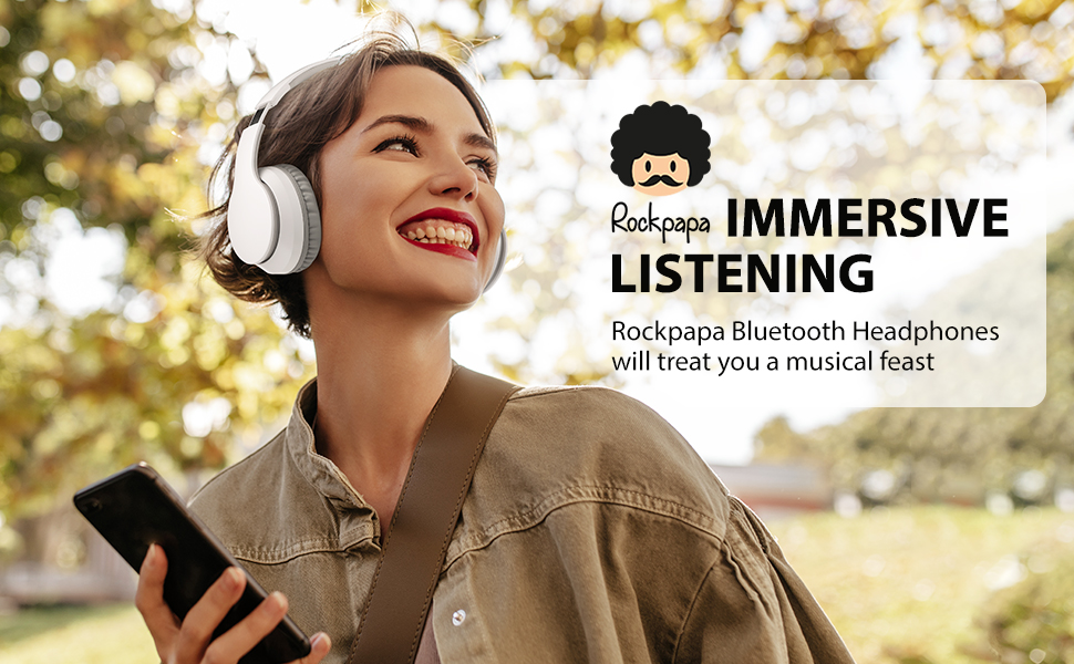 White wireless over-ear headphones product advertisement showing outdoor usage with 'Rockpapa Immersive Listening' text overlay.