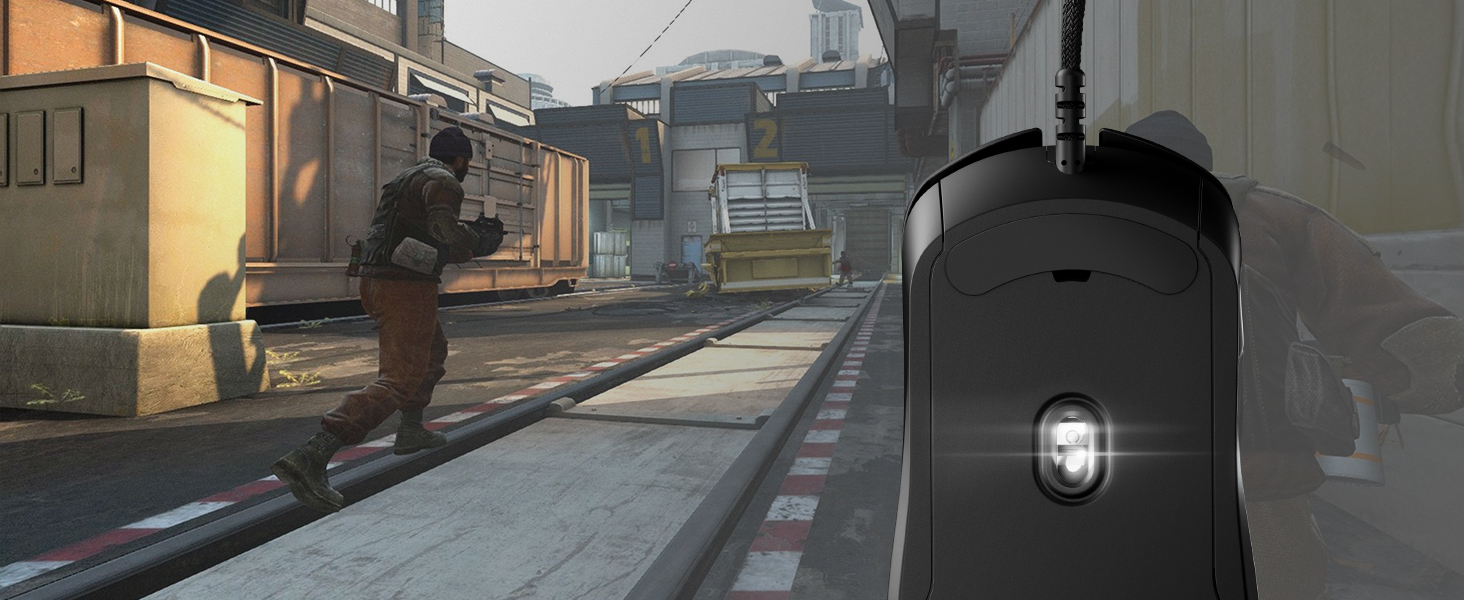 -Underside of SteelSeries Rival 5 mouse on top of CS:GO in-game screen