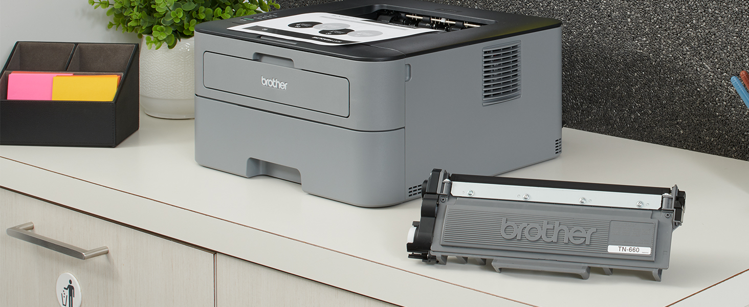 TN660 Toner Cartridge Next to Printer