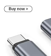 Multiple views of a sleek metallic device or adapter shown from different angles, displaying its slim profile and connection ports.