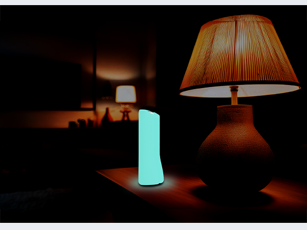 Remote case glowing in the dark on table for easy nighttime visibility