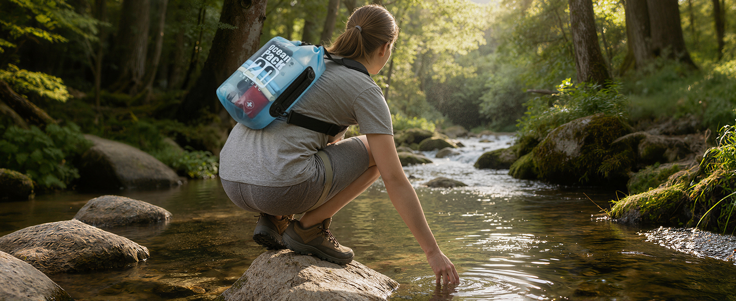 Waterproof dry bag &amp;amp; emergency whistle: gear protection for stream hiking and freshwater activities