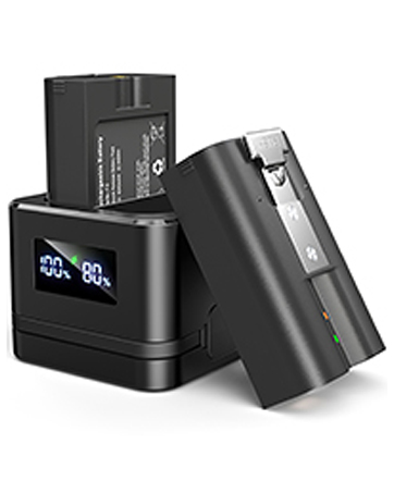 Black camera battery charger with digital display showing charge percentage. Two lithium-ion batteries, one in the charger and one beside it. Compact design with USB port visible.