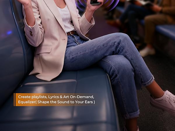 Person sitting on a subway bench, holding a MP3 playe with music-related features displayed