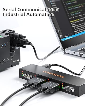 Industrial serial communication hub connected to laptop, featuring multiple ports for automation systems and data transfer.