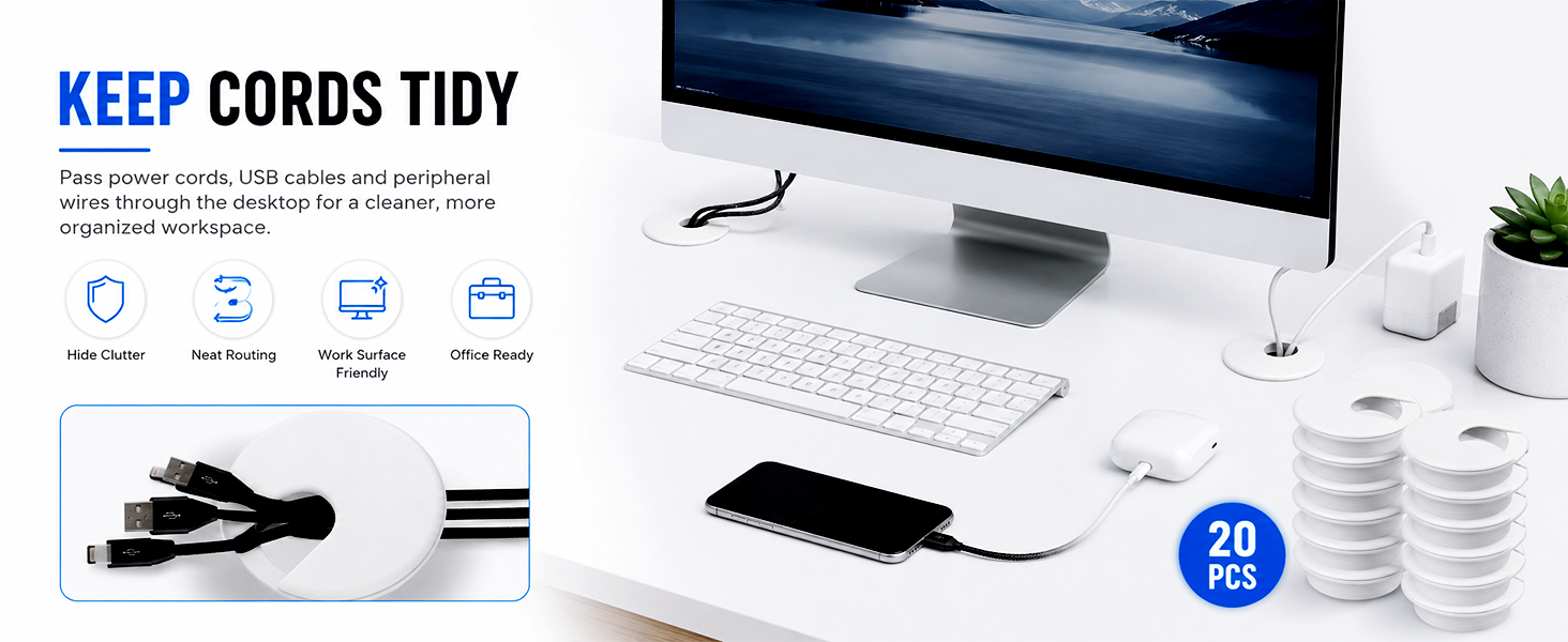White desk cable grommets keeping cords tidy on an office desktop