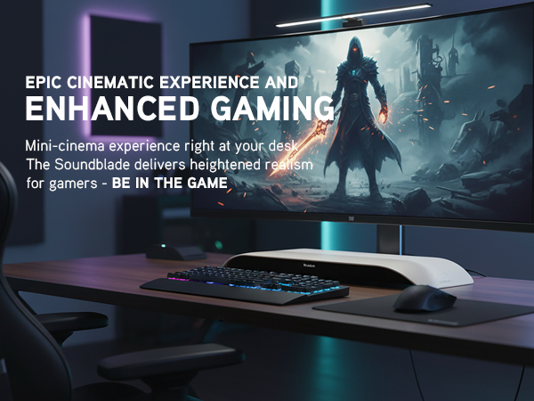 Gaming desk with widescreen monitor, RGB lighting and SoundBlade soundbar creating a cinematic setup