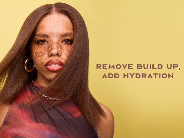 Image of a black woman with freckles &amp; straight hair next to text: "remove build up, add hydration".