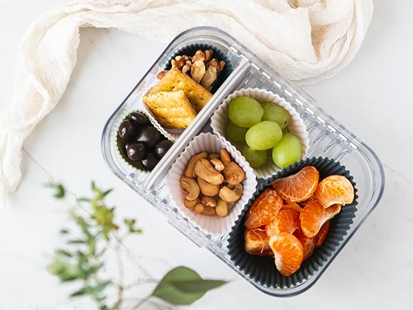 Snacks and fruit in a bento-style lunch box