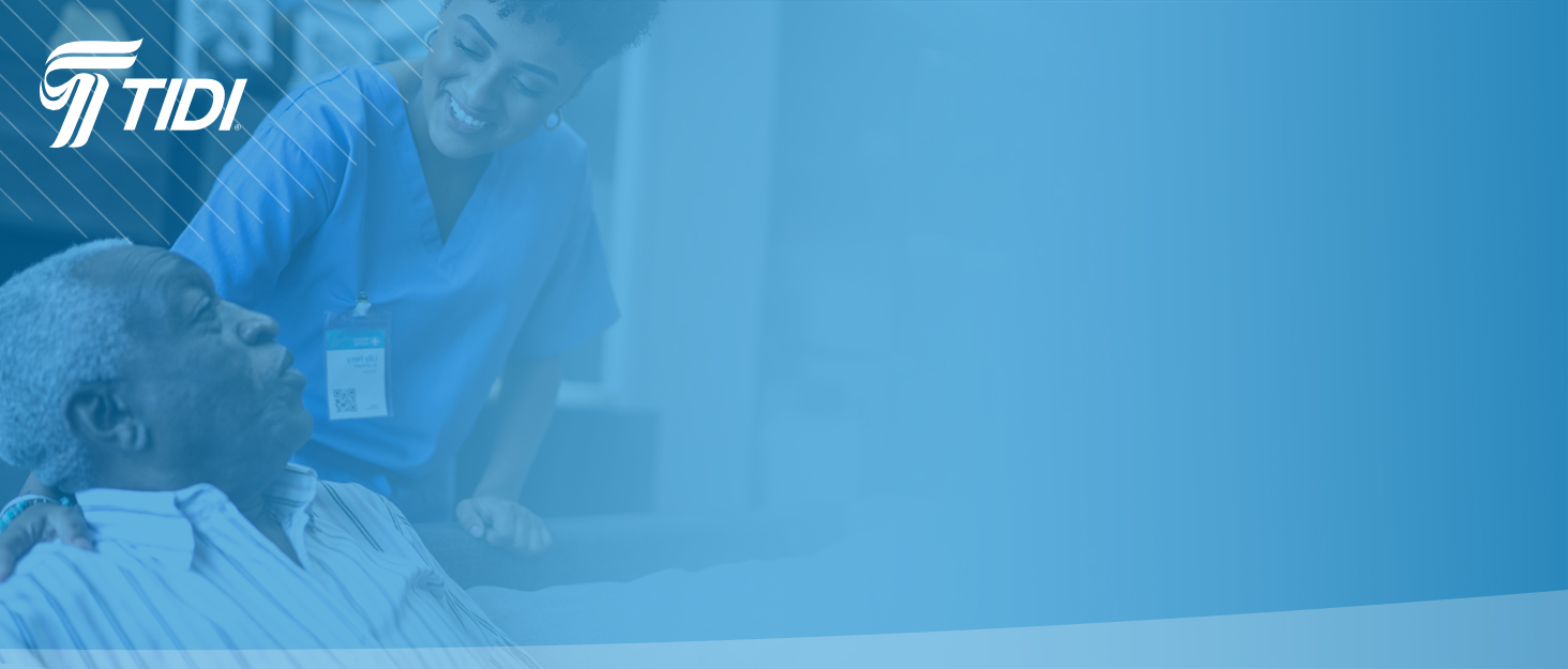 Smiling elderly patient with caregiver